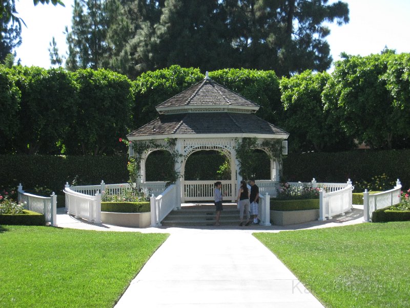 Disneyland 2010 HM Expo 0210.JPG - A gazebo... I wonder if they have to repaint it every year and replace the lights every two years like the one by our house.